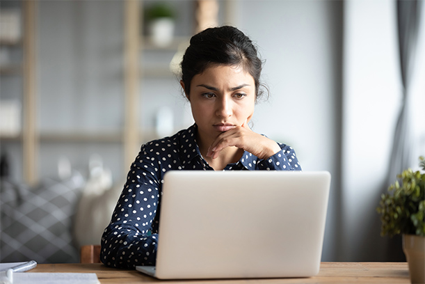 Shot of a couple looking stressed out while working on their finances at home