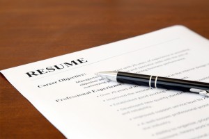 Resume paper with a pen