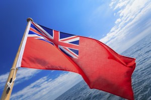 British Red Ensign flag waving off the back of a yacht